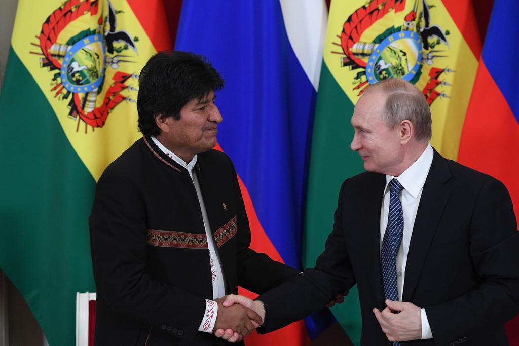Morales elogió a Putin por encabezar la labor mundial para 'proteger el orden internacional, oponerse al uso de fuerza en asuntos internacionales y evitar la injerencia en los asuntos internos de otros países'. (EFE)