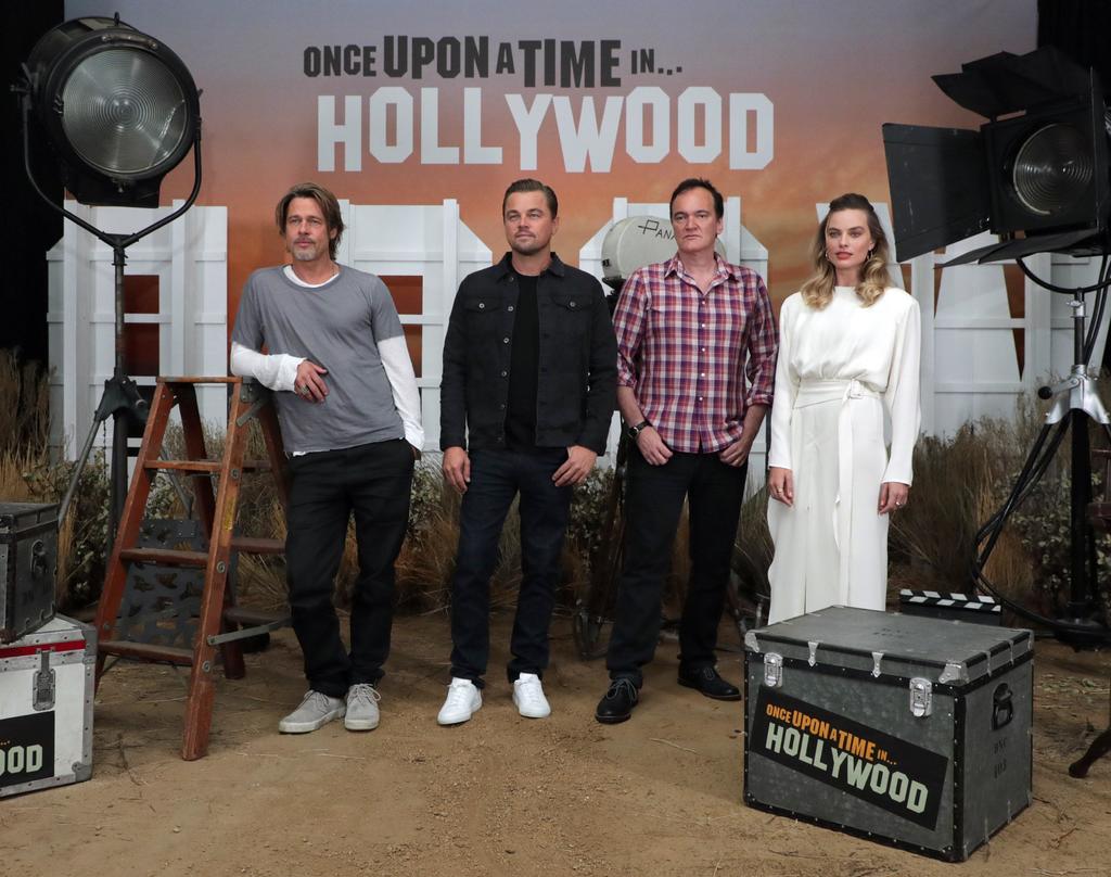 Presentación. Quentin Tarantino y su reparto Leonardo DiCaprio, Brad Pitt y Margot Robbie. (EFE)