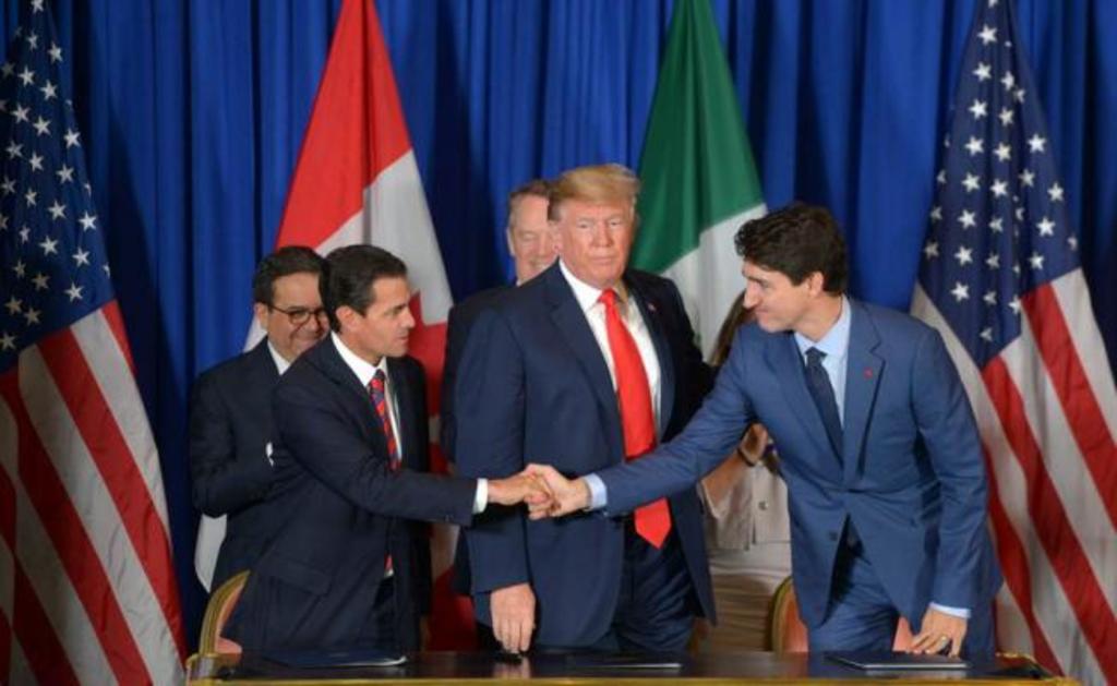 El T-MEC fue firmado el pasado 30 de noviembre de 2018 por el presidente Enrique Peña Nieto, Donald Trump y el primer ministro Justin Trudeau. (ARCHIVO)