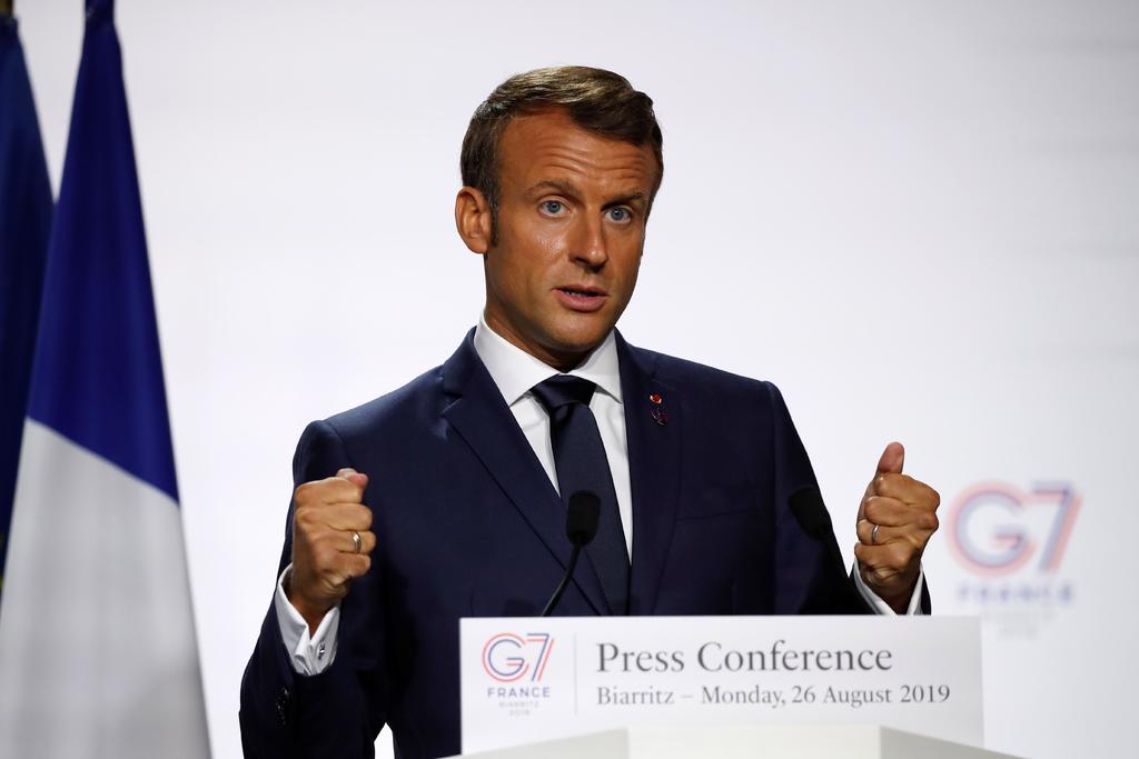 'La incertidumbre es mala para la economía mundial, así que cuanto antes se alcance un acuerdo mejor para la economía', afirmó Macron. (EFE)