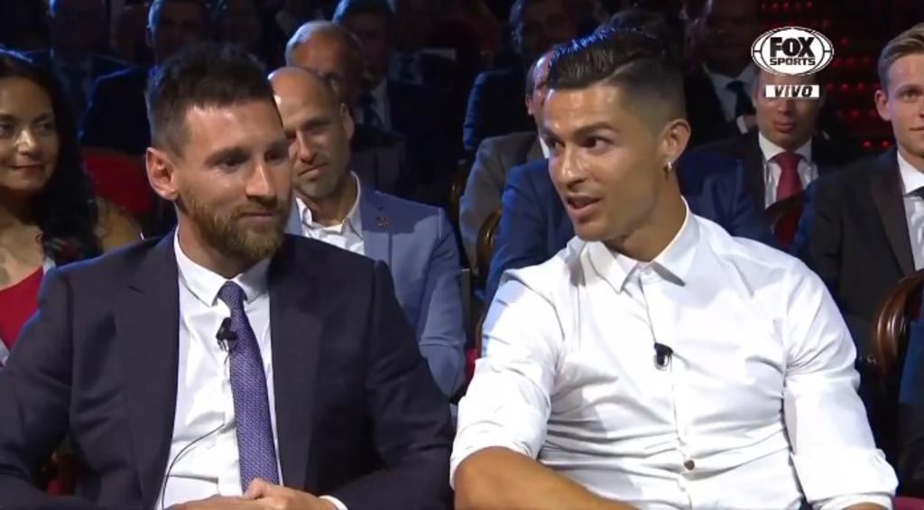 Cristiano Ronaldo y Lionel Messi se robaron la atención durante sus asistencia en el sorteo de grupos de la Champions League. (ESPECIAL)