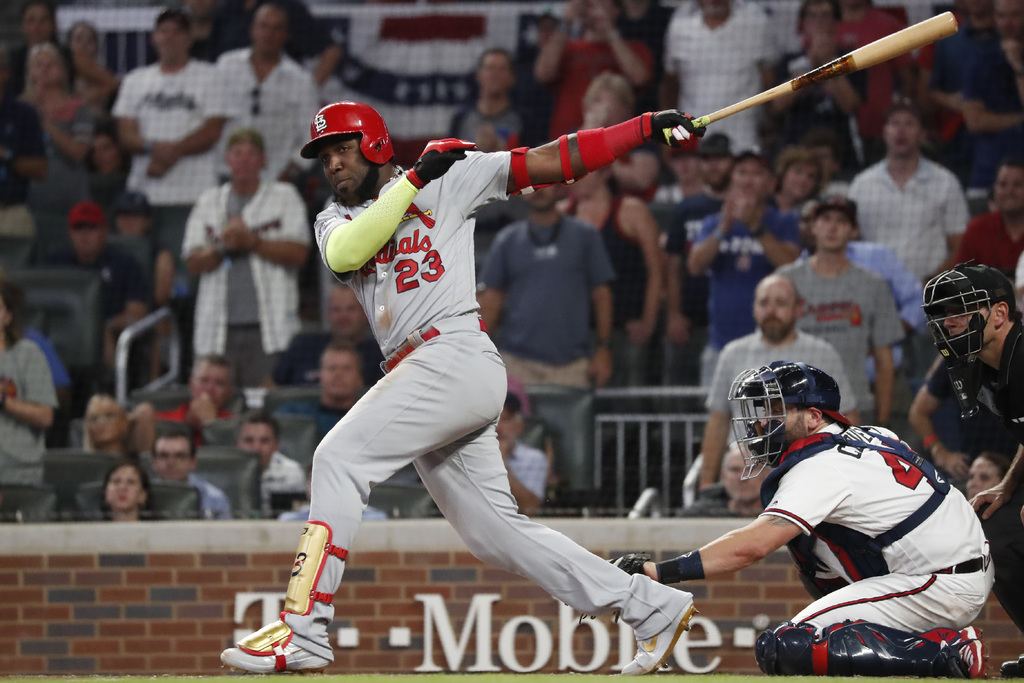 Marcell Ozuna conectó un sencillo de dos carreras para aportar en la novena entrada del juego entre Cardenales y Bravos. (AP)