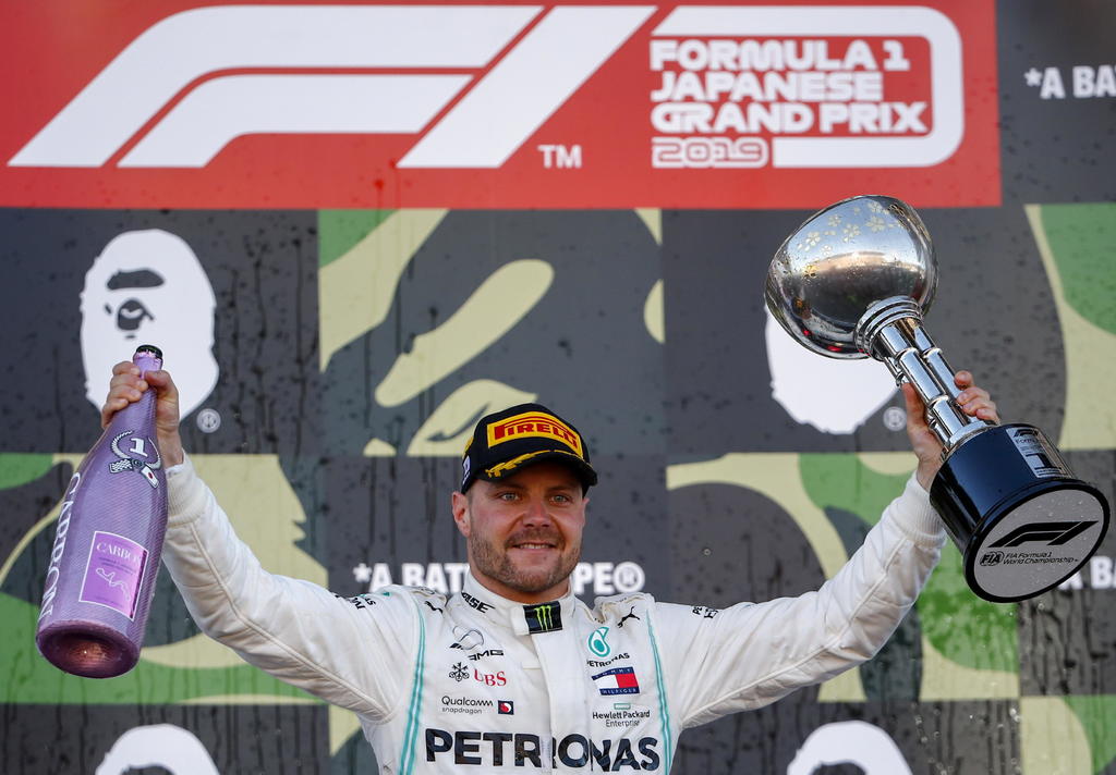 El finlandés Valtteri Bottas se llevó el Gran Premio, seguido por el alemán de Ferrari Sebastián Vettel y el británico Lewis Hamilton para completar el podio. (EFE)