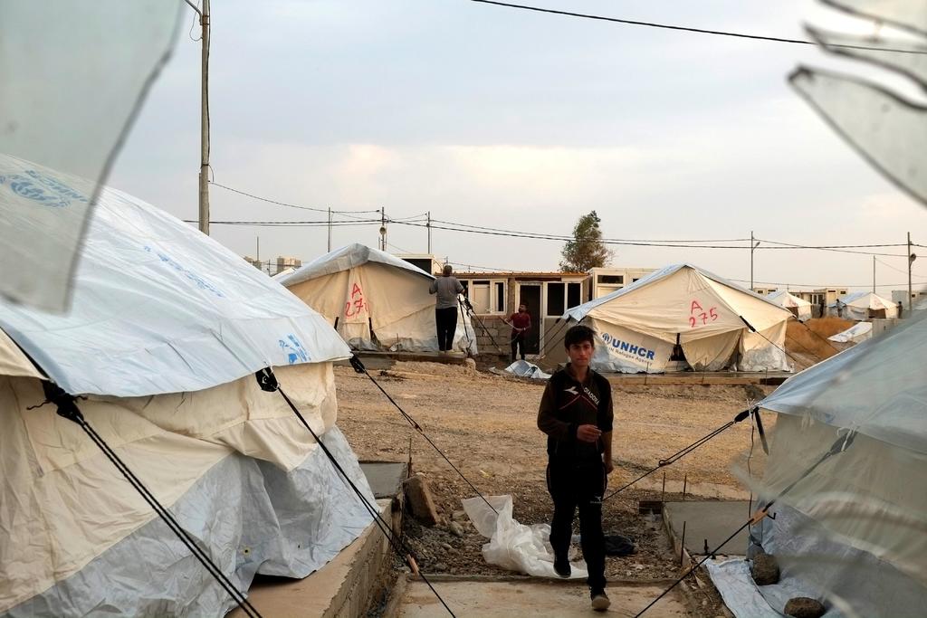 Más de 5 mil 400 sirios habrían llegado hasta ayer al Kurdistán iraquí, sorteando dificultades. (EFE)
