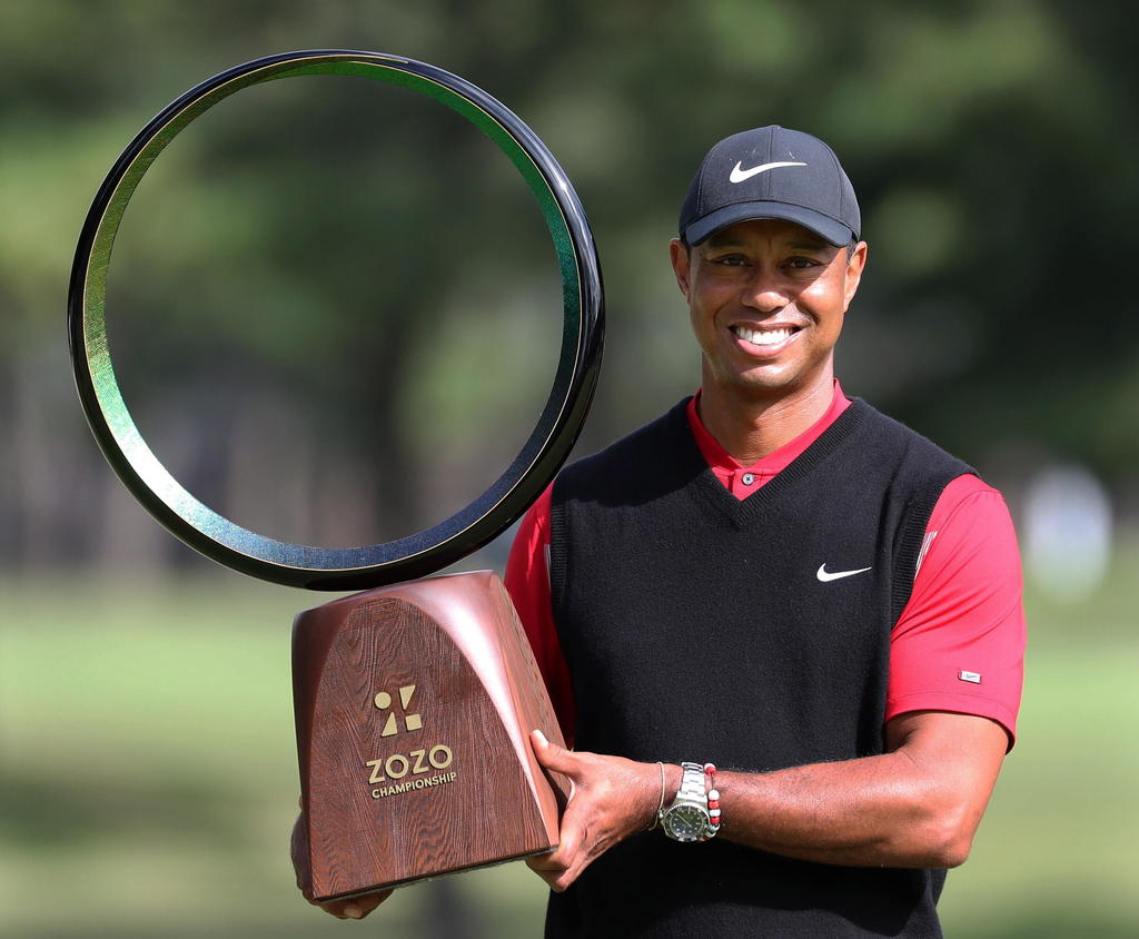 Tiger Woods ganó su título 82 en el Japón Golf Tour. (EFE)