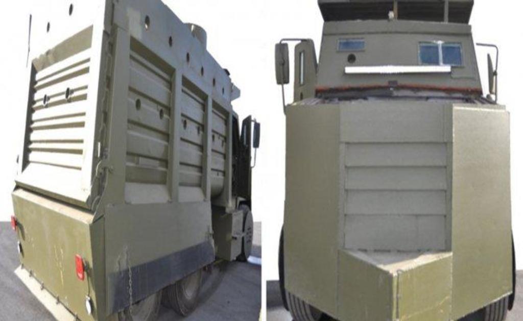 Dos vehículos pesados con blindaje artesanal que serían utilizados como tanques de combate por el cártel de Jalisco Nueva Generación, fueron asegurados por la Fiscalía de Jalisco en el municipio de Tuxpan. (ESPECIAL)