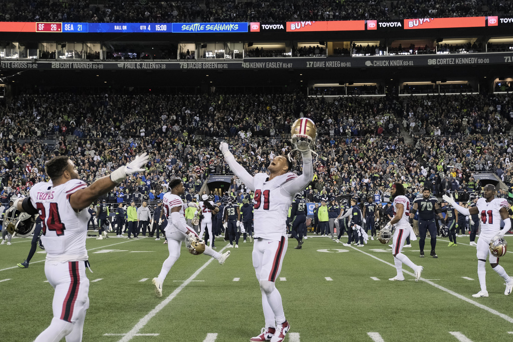 Con su dramático triunfo del domingo sobre Seattle, los 49'ers de San Francisco obtuvieron el primer sembrado de la Nacional. (AP)