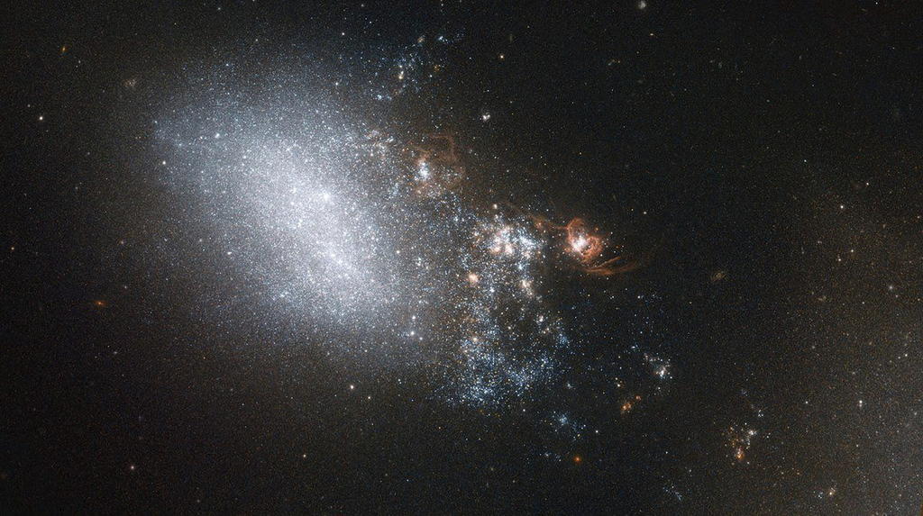 La galaxia Rubin, localizada por el telescopio espacial Hubble, es 2.5 veces más ancha que nuestra Vía Láctea y contienen diez veces más estrellas. (ARCHIVO)