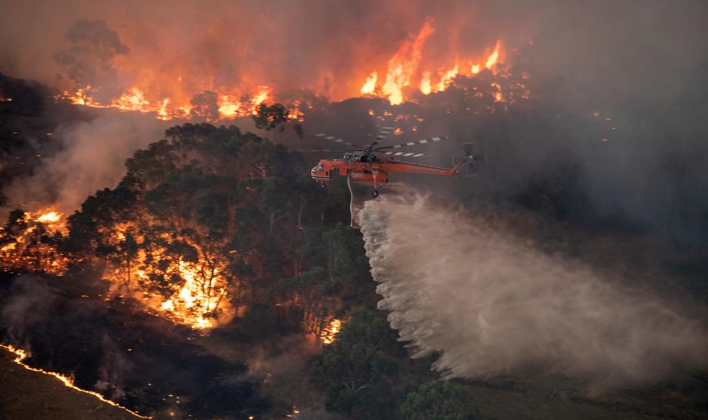 Los incendios abarcan aproximadamente 8 millones de hectáreas entre Nueva Gales del Sur, Victoria, Australia del Sur y Queensland. (EFE) 