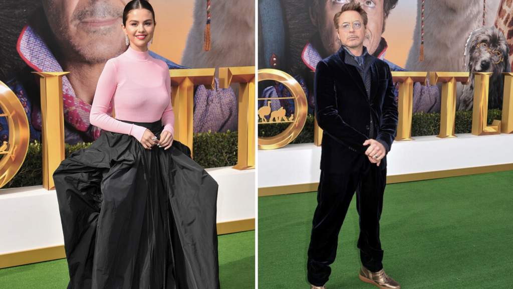 Impacta. Selena Gomez deslumbró con un vistoso conjunto compuesto por una elegante y amplia falda negra y un suéter rosa. (AP)