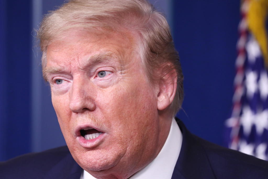 El presidente republicano de Estados Unidos, Donald Trump, anunció en conferencia de prensa que ya firmó la orden ejecutiva para suspender temporalmente la migración. (EFE)
