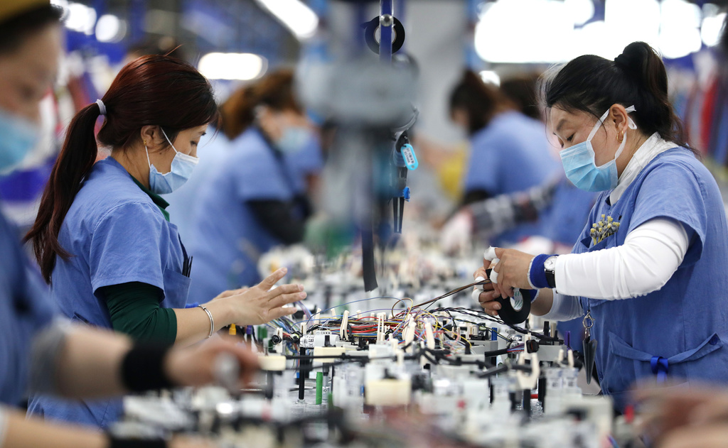 Un gran número de empresas en Hubei ya reactivaron sus actividades, según el último reporte. (EFE) 
