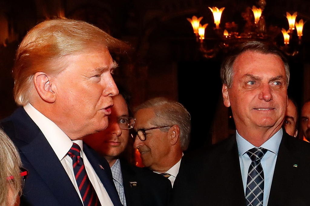 El presidente brasileño, Jair Bolsonaro, dijo este lunes que conversó con su homólogo estadounidense, Donald Trump, sobre el posible ingreso de Brasil al G7 renovado propuesto por Estados Unidos. (ARCHIVO)