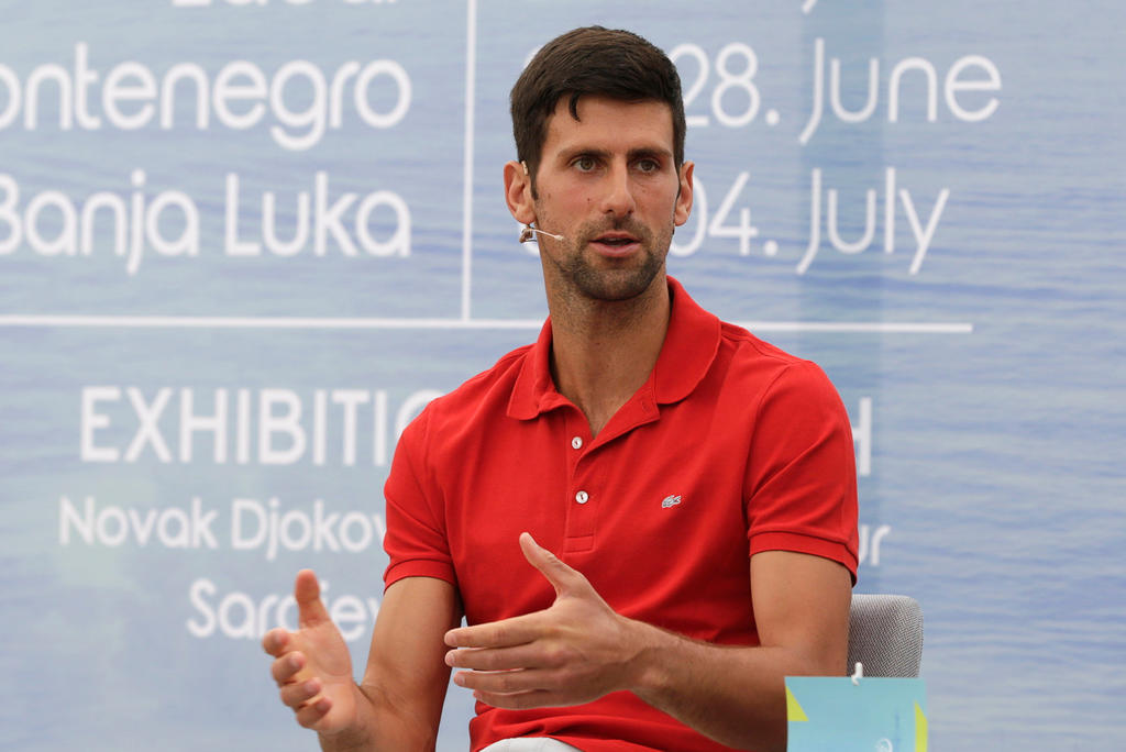 Novak Djokovic, número uno del mundo, pidió disculpas por las consecuencias causadas en su torneo, el Adria Tour, que provocó varios contagios por coronavirus, entre ellos el propio jugador serbio y su mujer, el búlgaro Grigor Dimitrov o el croata Borna Coric. (ARCHIVO)