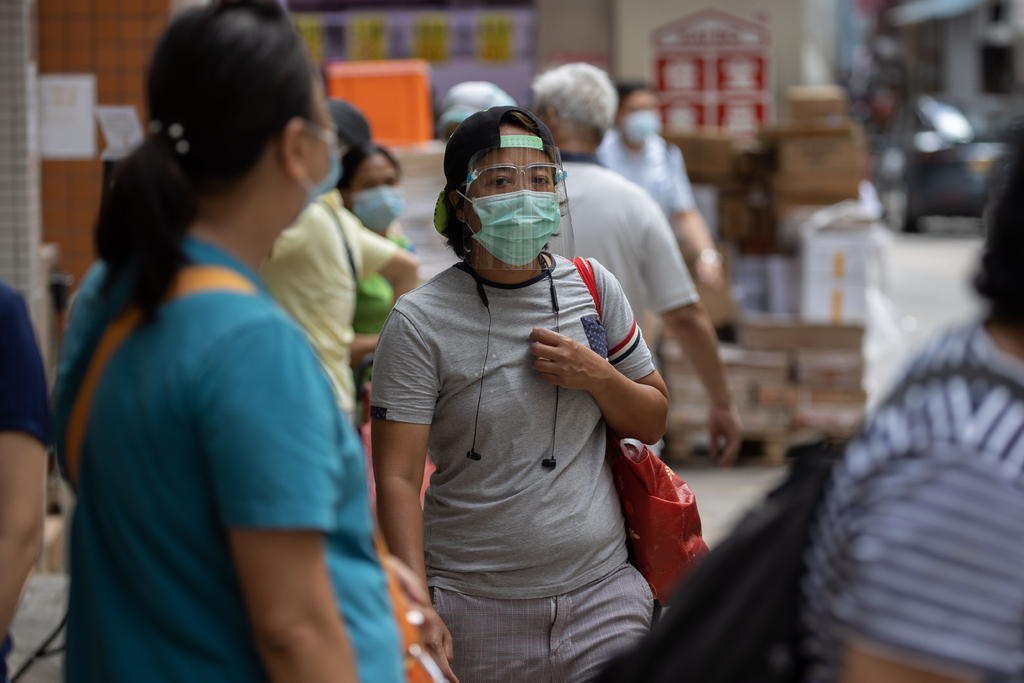 La Comisión Nacional de Sanidad de China informó hoy de que el país asiático registró 23 nuevos contagios del coronavirus SARS-CoV-2 este sábado, 8 menos que en la víspera. (ARCHIVO)