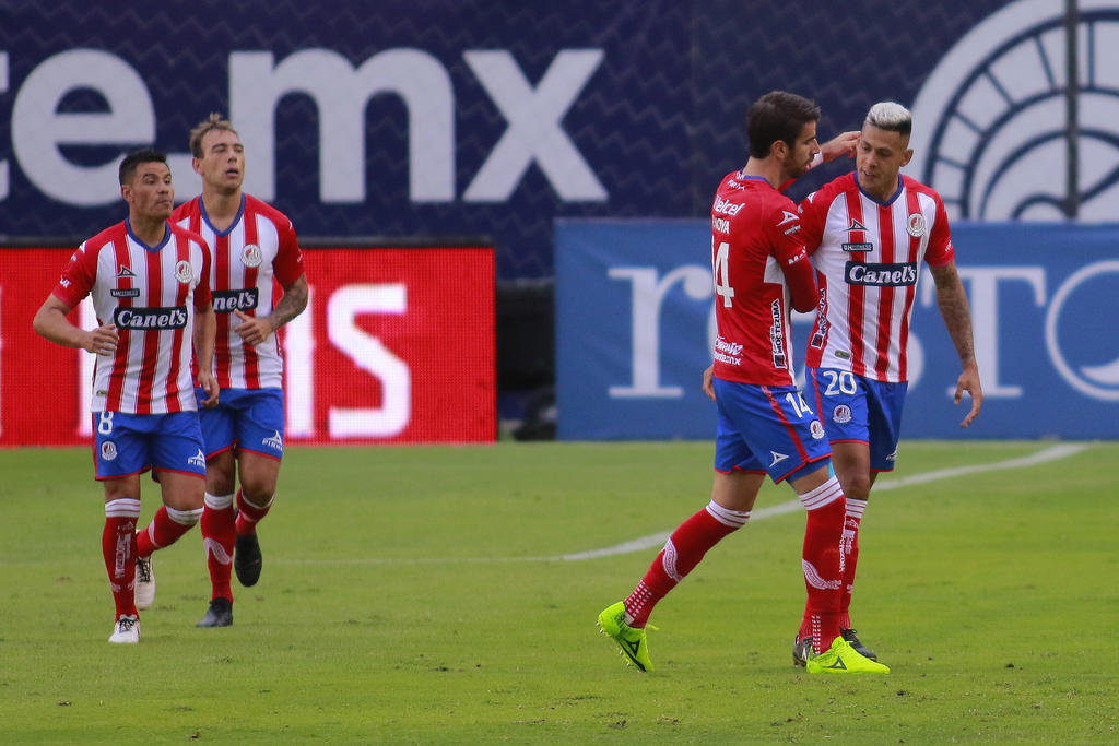 El argentino Mauro Quiroga anotó este domingo un gol de cabeza en el minuto 35 y rescató para el San Luis, sucursal mexicana del Atlético de Madrid, un empate 1-1 con el Atlas. (ARCHIVO)