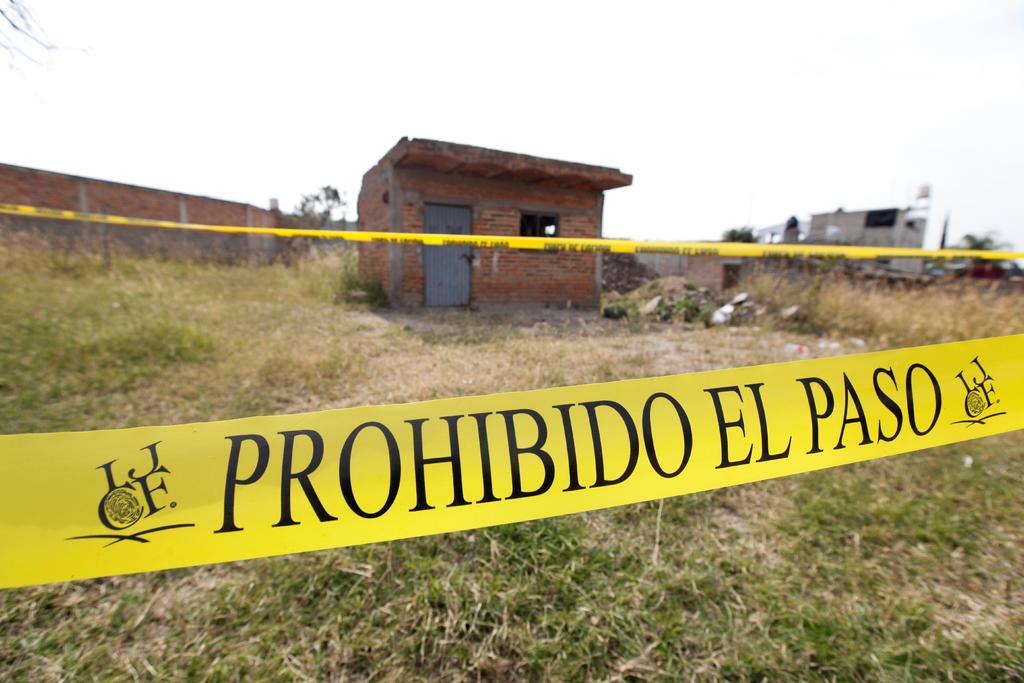  Tras un enfrentamiento en Tlajomulco, elementos de la Fiscalía de Jalisco lograron rescatar a ocho personas privadas de su libertad; además localizaron sin vida a otro hombre que estaba en cautiverio y detuvieron a tres presunto delincuentes. (ARCHIVO)