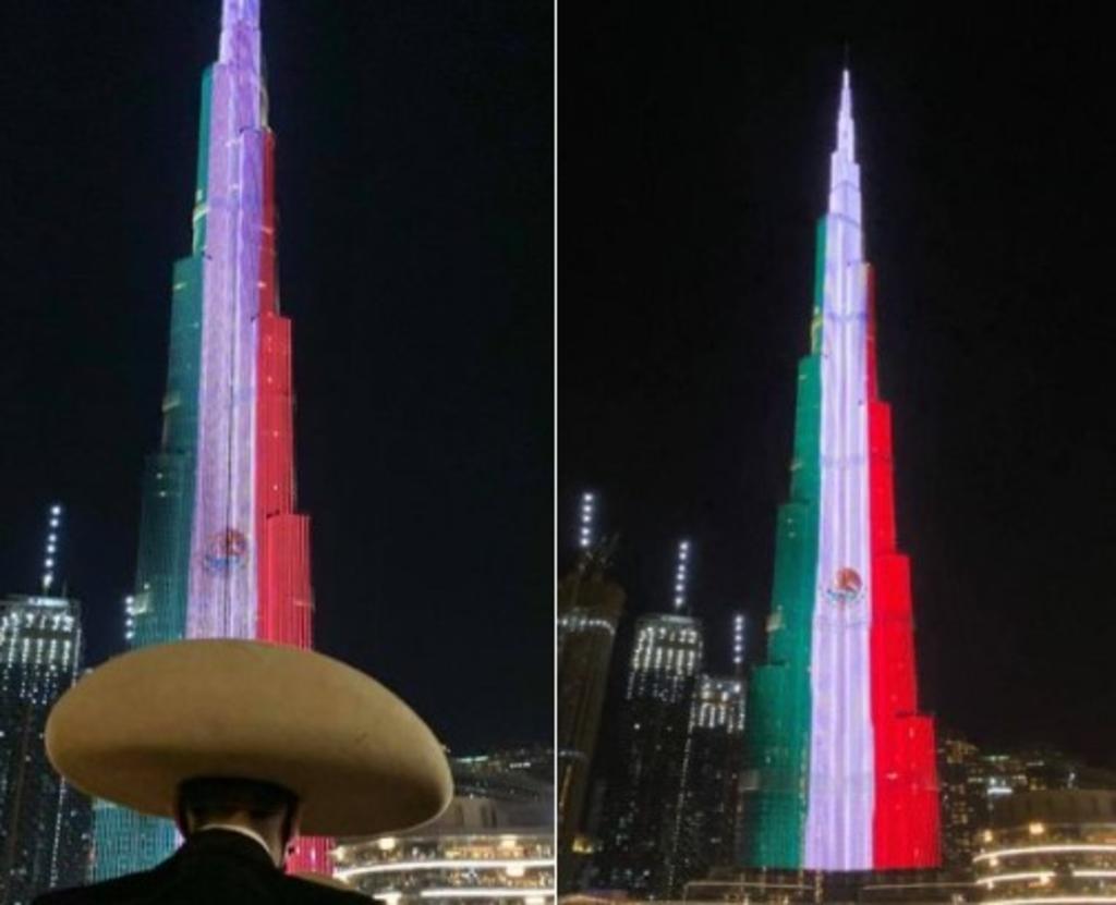 La bandera de nuestro país iluminó la noche frente a mariachis y ciudadanos en sus  163 pisos y 828 metros de altura. (Facebook) 