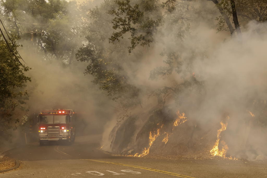 Los incendios forestales en California han quemado este año más de 16,190 kilómetros cuadrados (6,250 millas cuadradas) de superficie, más del doble del récord anterior para un año en ese estado. (ARCHIVO) 