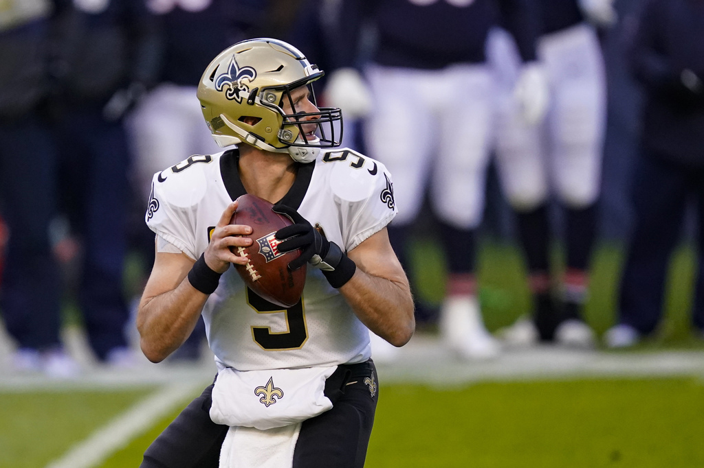Los Santos de Drew Brees (i) y los Bucaneros de Tom Brady (d) tienen hoy un choque trascendental en la división Sur de la Conferencia Nacional.