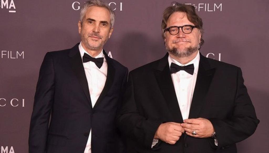 Los cineastas mexicanos Guillermo del Toro y Alfonso Cuarón compartirán el próximo viernes, como parte del evento solidario Inconscientes Posmodernos, una conversación grabada que el director de Roma consideró este lunes como 'muy íntima y personal'. (ESPECIAL) 
