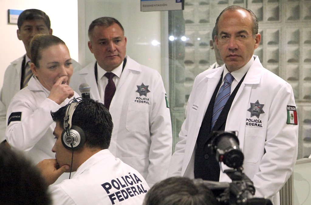 En la imagen aparece Genaro García Luna, exsecretario de Seguridad Pública, con Felipe Calderón. (ARCHIVO) 
