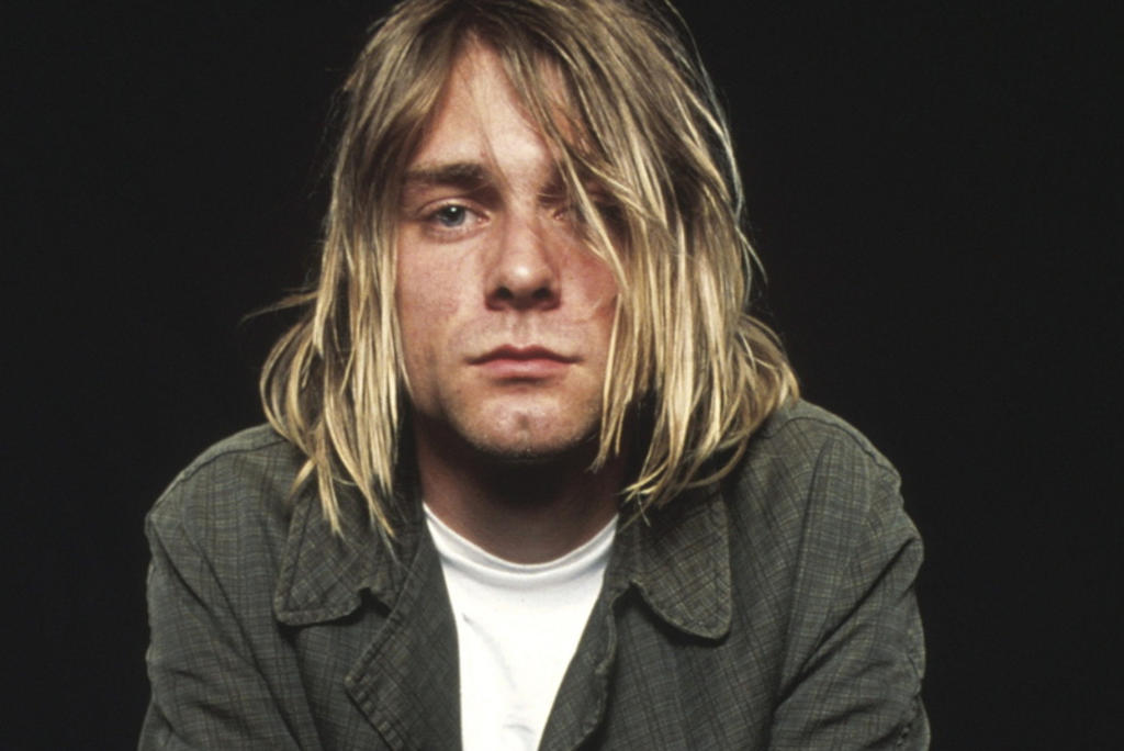 Cobain, iniciador del movimiento denominado grunge, es recordado a 54 años de su nacimiento, que se cumplen este sábado. (ARCHIVO)