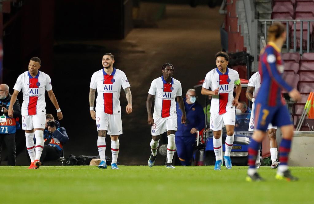 Tres goles de Kylian Mbappé y uno de Moise Kean firmaron el triunfo del PSG, por 1-4, ante el Barcelona en el Camp Nou, en la ida de los octavos de final de la Liga de Campeones. (EFE)