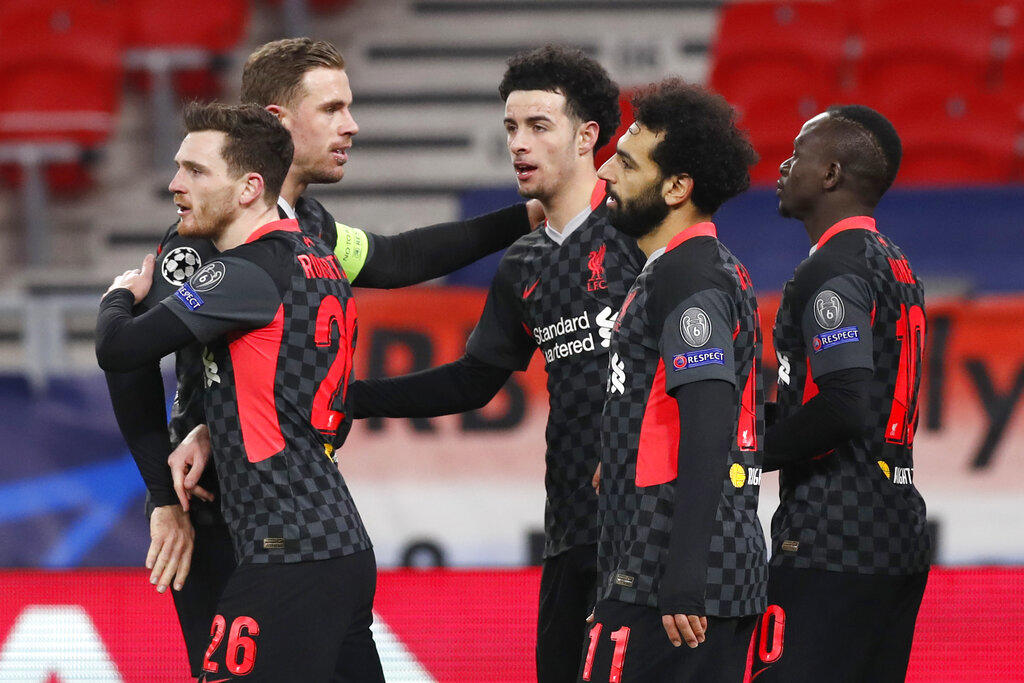 El Liverpool se impuso este martes por 0-2 al RB Leipzig, con goles de Mo Salah y Sadio Mané, con lo que puso un pie en cuartos de final ya que el equipo alemán necesitaría un 0-3 para lograr la remontada en Anfield Road. (AP)
