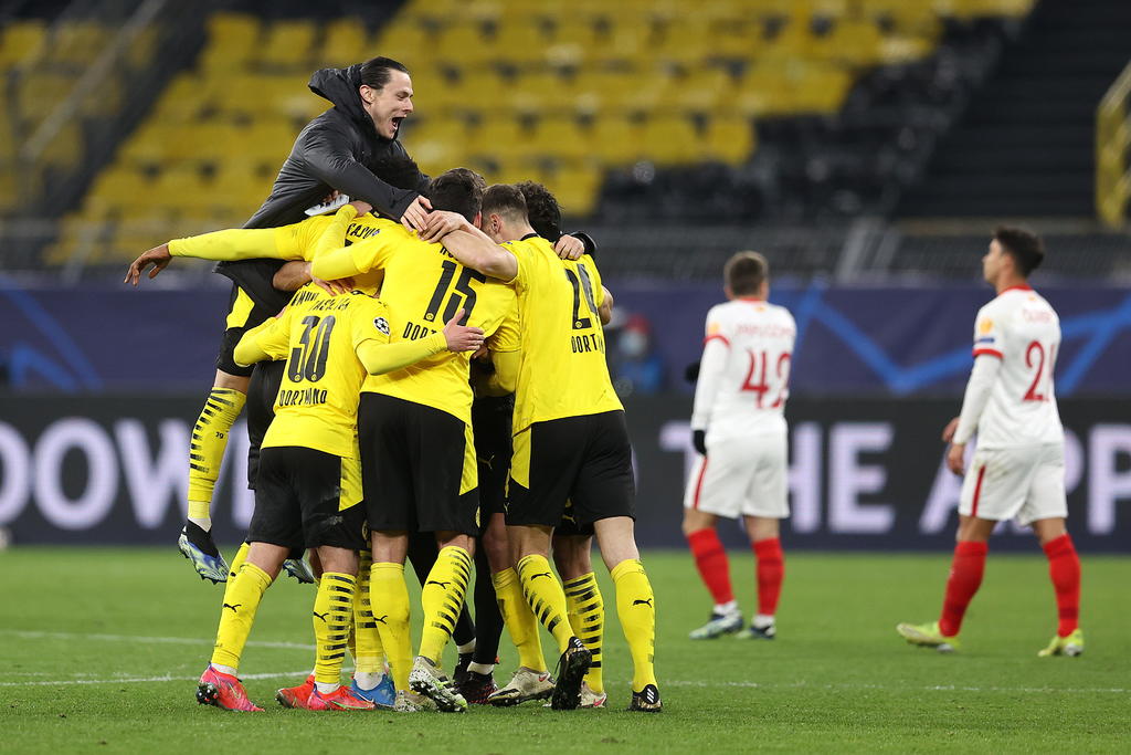 El Borussia Dortmund eliminó este martes al Sevilla de la Liga de Campeones con un empate a dos goles en casa, un resultado que le bastó tras su victoria por 2-3 en la ida. (EFE)
