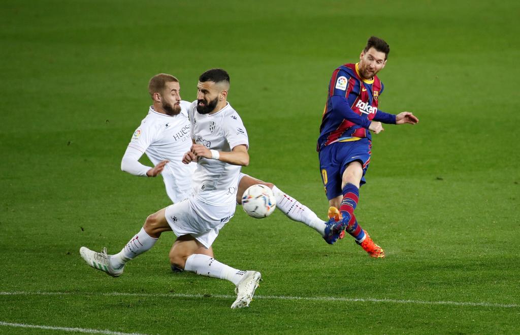 Lionel Messi metió dos tantos en la victoria del Barcelona 4-1 sobre Huesca; el argentino llegó a 661 goles marcados con los culés. (EFE)