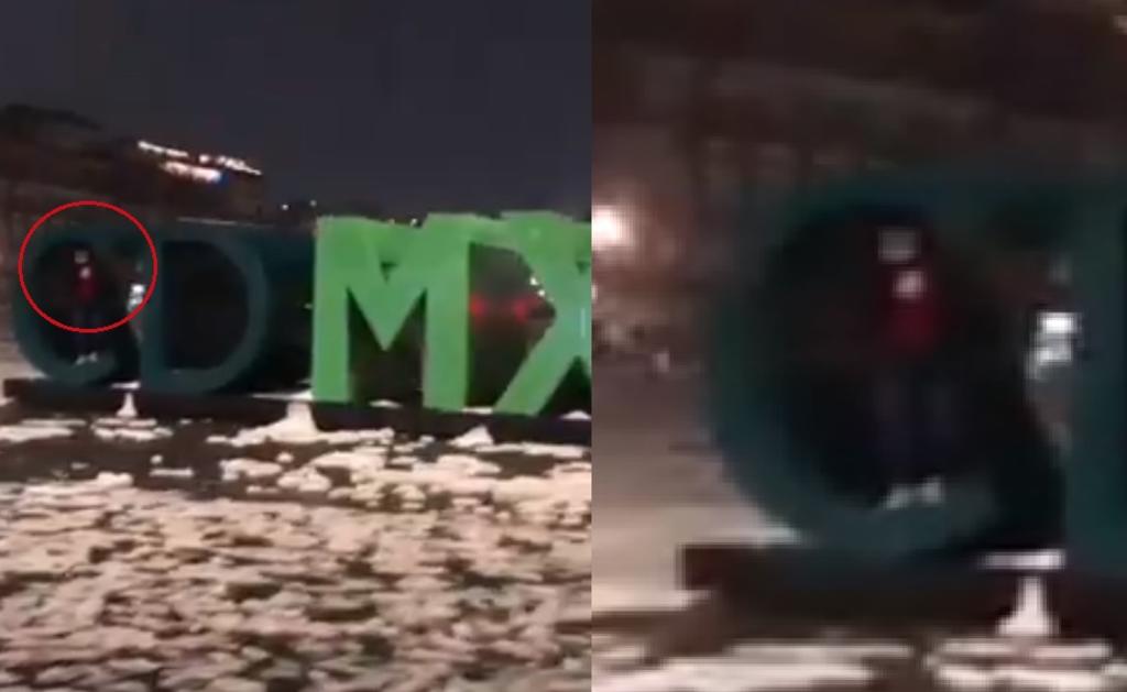 Tras ser captada en video, la persona que quedó atrapada en el letrero de la 'CDMX' durante la granizada, se volvió viral en redes sociales (CAPTURA) 