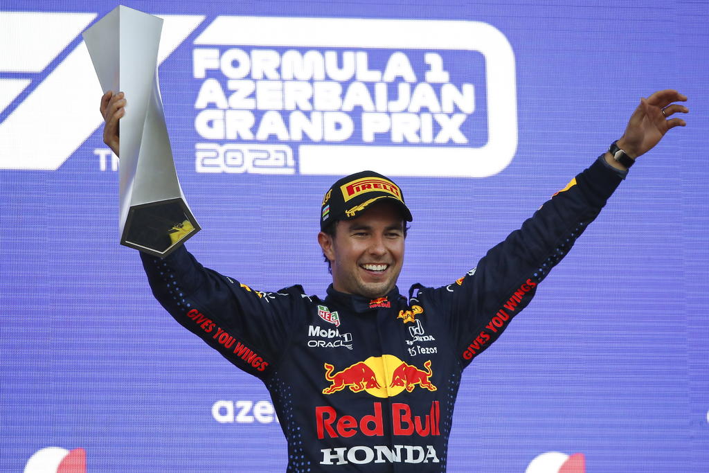 El piloto mexicano de Fórmula 1 de Red Bull Sergio Pérez declaró que es un 'gran impulso' para el equipo saber que tienen dos coches que pueden luchar por el campeonato, y que 'todo el equipo quiere ganar'.
(ARCHIVO)