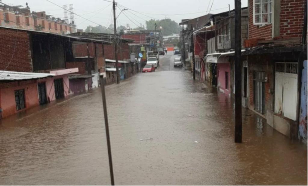 La tormenta tropical 'Dolores' dejó inundaciones severas, desbordamiento de ríos y arroyos, vehículos varados, así como daños a viviendas. (ESPECIAL) 
