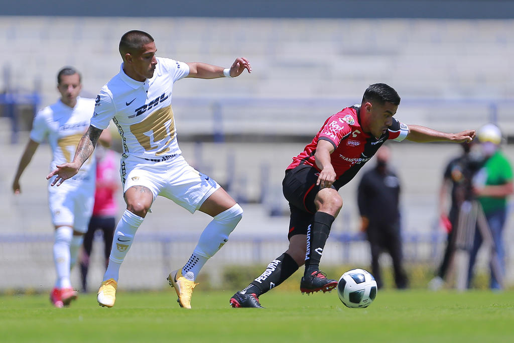 Pumas y Atlas comenzaron el domingo su camino en el torneo Apertura con un insípido empate de 0-0 ante las gradas vacías del Estadio Olímpico Universitario. (JAM MEDIA) 
