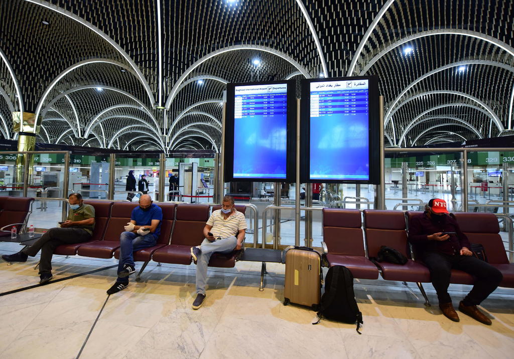 Irak ha suspendido hasta nuevo aviso los vuelos a Minsk, después de que Bagdad fuera presionado por la comunidad internacional para frenar la inmigración ilegal de iraquíes que cruzan de Bielorrusia a Lituania, donde en las últimas semanas se ha disparado el flujo de migrantes hacia territorio de la Unión Europea. (ARCHIVO) 

 