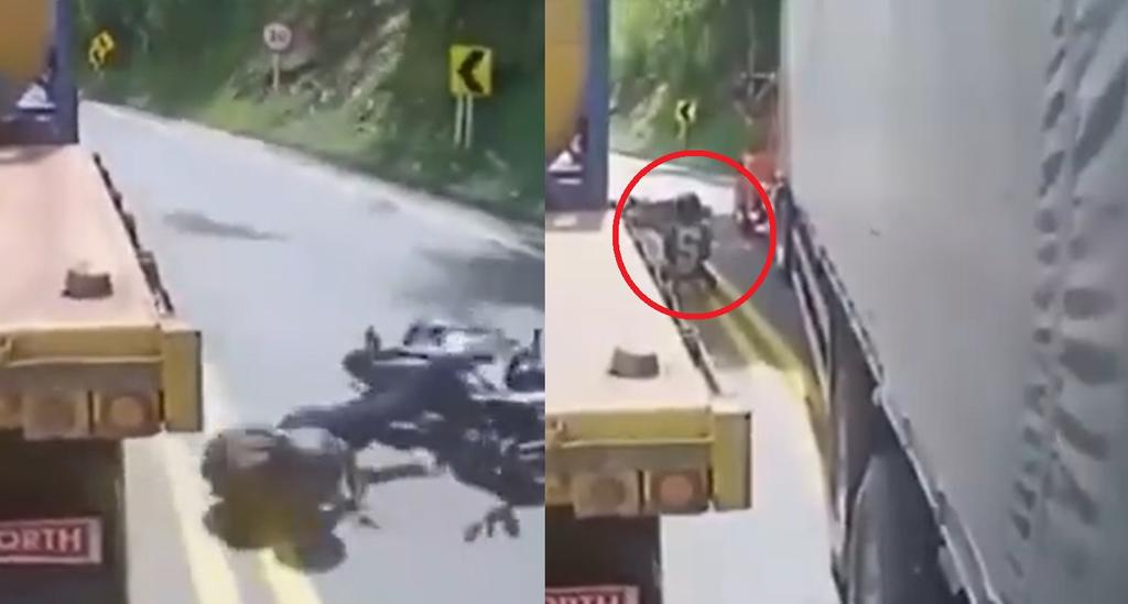 El conductor de la moto terminó tendido en la carretera tras derrapar en ésta mientras pasaban a sus costados dos trailers (CAPTURA) 