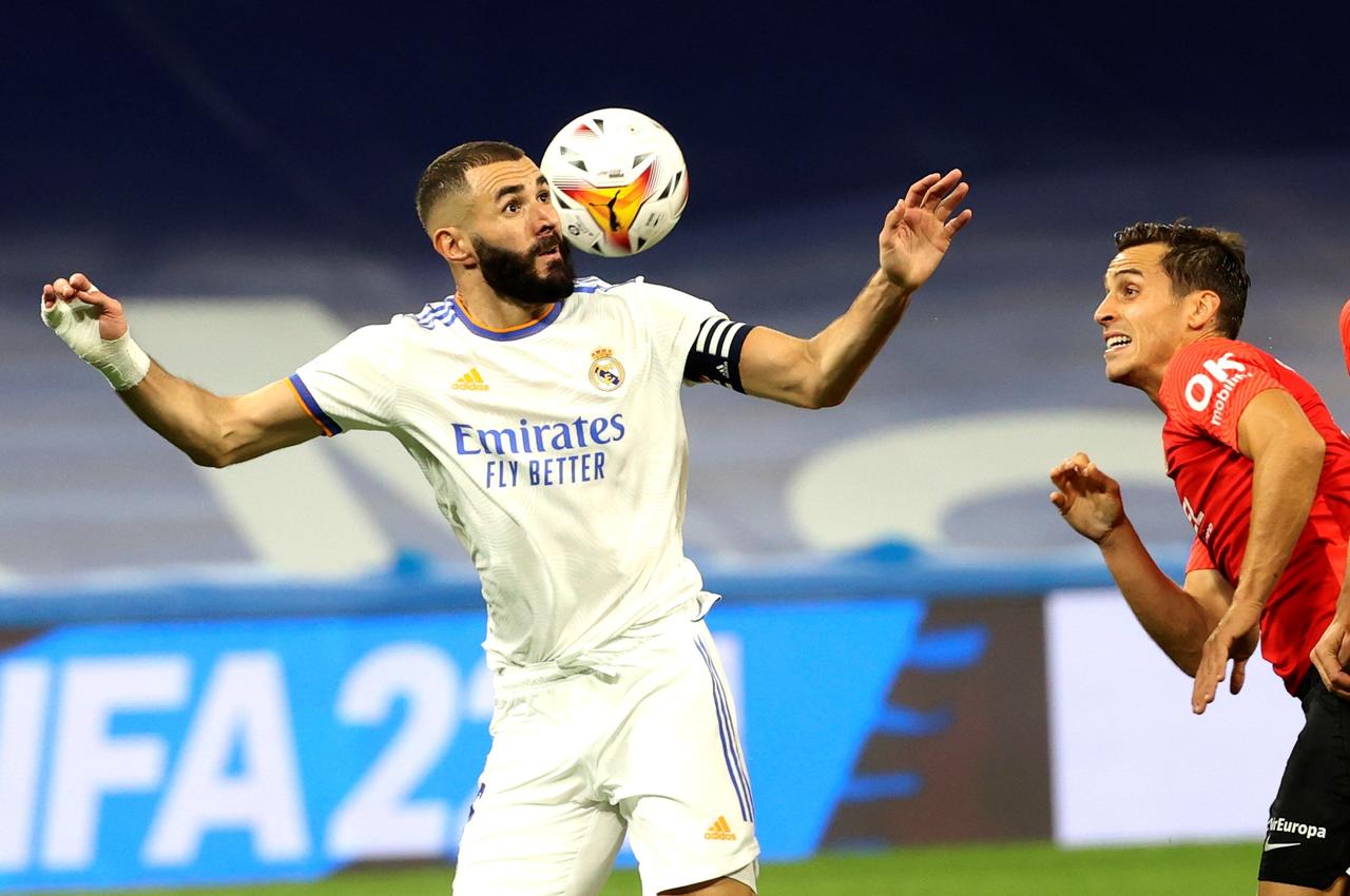 Marco Asensio y Karim Benzema se mostraron letales y Real Madrid trituró el miércoles 6-1 al Mallorca para afianzarse como líder de La Liga española. (EFE) 
