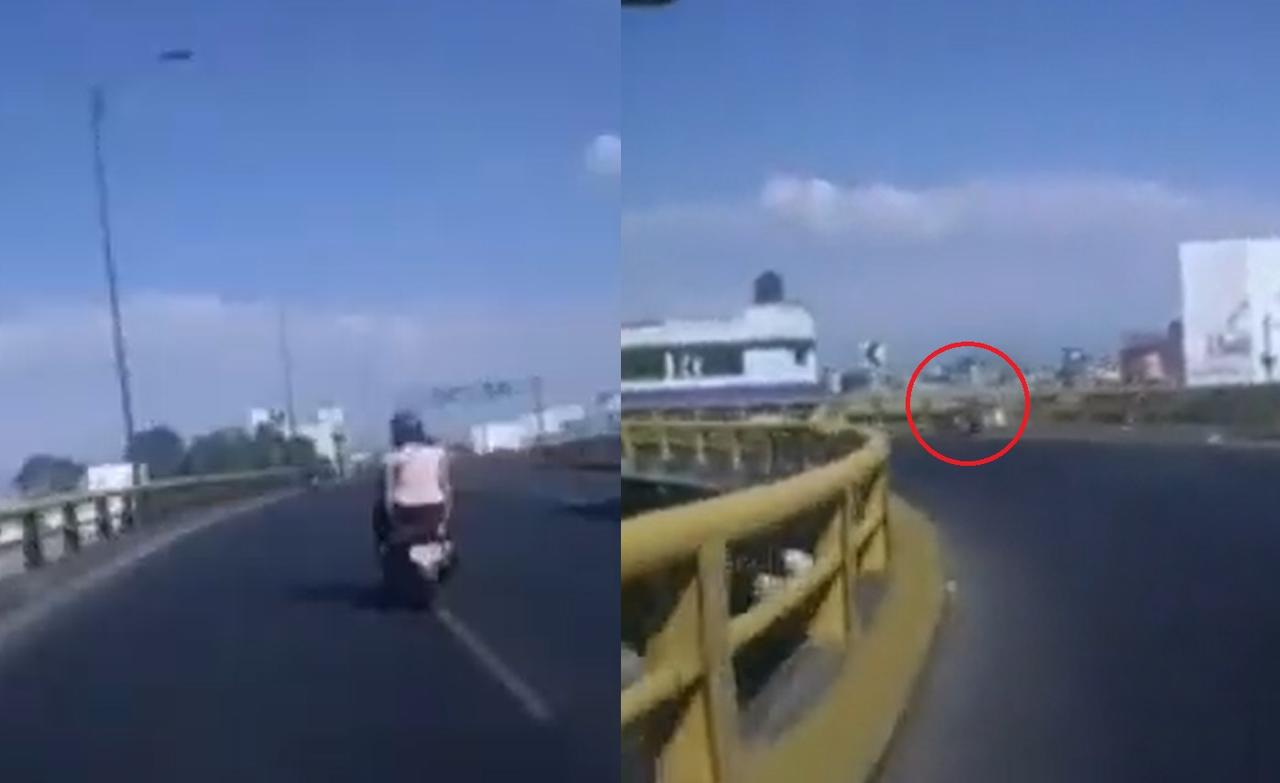 Un motociclista captó en video el momento en que ambas mujeres impactaron contra el muro de contención para después caer desde lo alto del puente en Nezahualcóyotl (CAPTURA) 