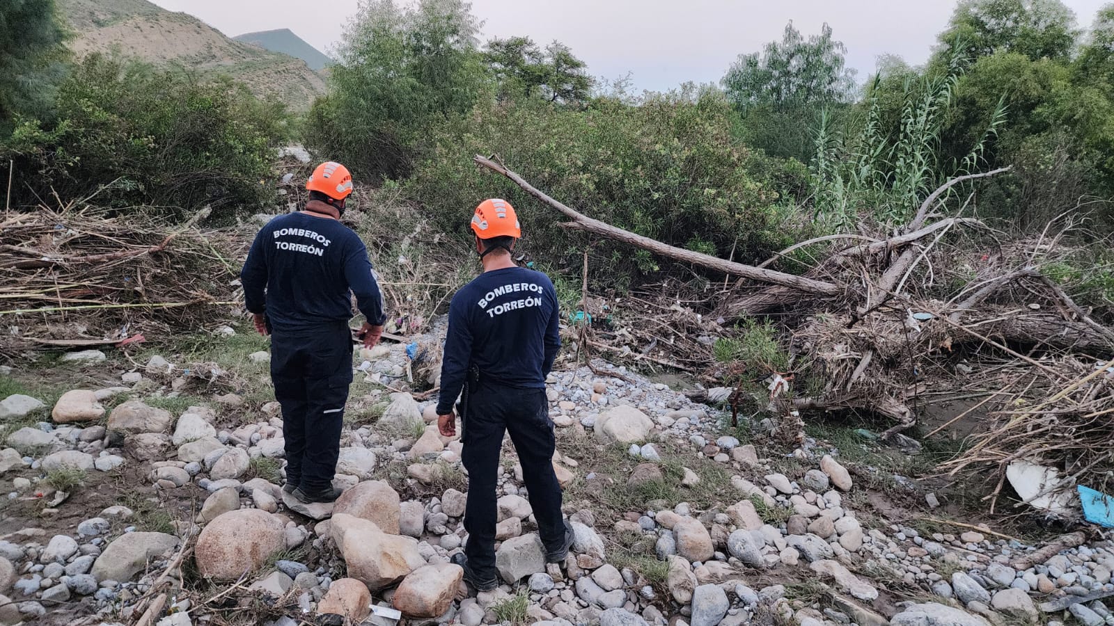 In Ramos Arizpe, they find two of the three men swept away by the current