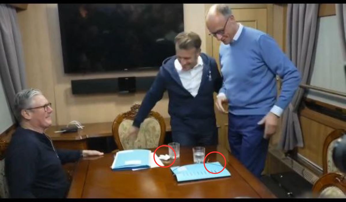 Captan a Macron y Merz “escondiendo” objetos sospechosos durante su viaje a Ucrania | VIDEO